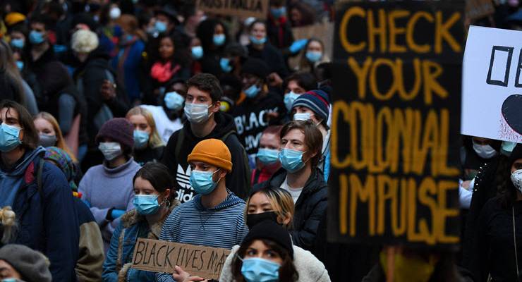 protesters wearing masks at black lives matter rally in melbourne