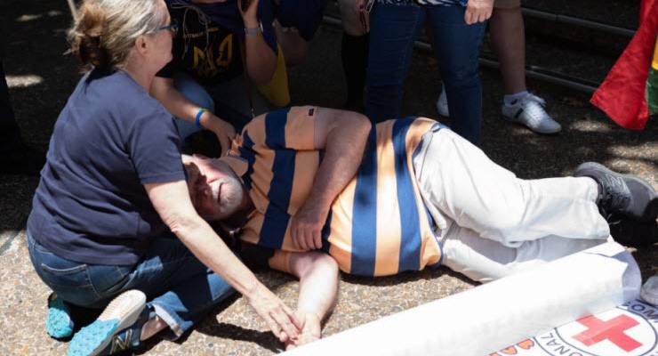 The 76-year-old man waits for medical assistance
