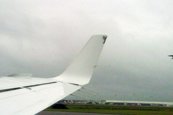 r699450_5345567 Note also the surface burning at the top of the winglet of Anna Bligh's turbo-prop