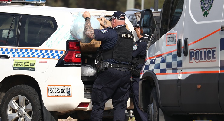 Police near the scene of the fatal shooting in Wieambilla, Queensland in December 2022 (Image: AAP/Jason O'Brien)