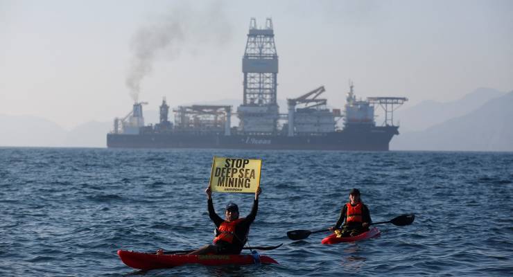 Greenpeace activists from New Zealand and Mexico confront the deep sea mining vessel Hidden Gem, commissioned by Canadian miner The Metals Company, as it returned to port from eight weeks of test mining in the Clarion-Clipperton Zone