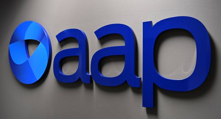 The AAP logo on the wall of its Sydney bureau (Image: AAP/Dean Lewins)