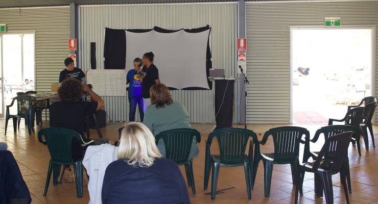 Liberal Senator Kerrynne Liddle (centre, in green) at the education conference