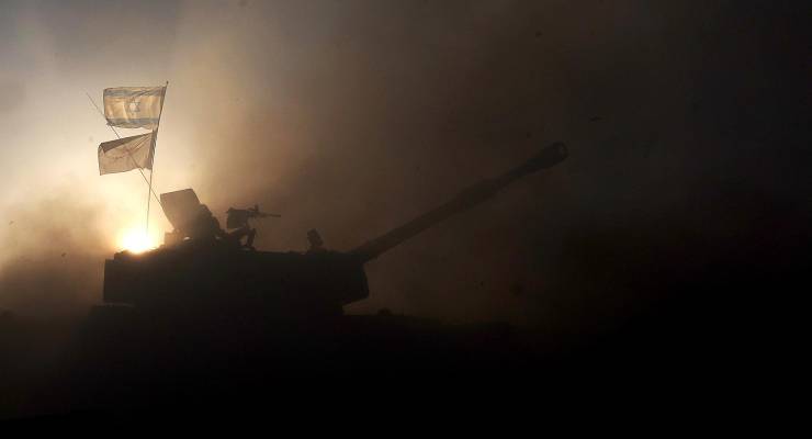 An artillery unit fires shells near the Gaza border in southern Israel (Image: EPA/Neil Hall)