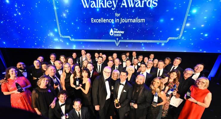 Australian journalists stand with their awards on the night 68th Walkley Awards