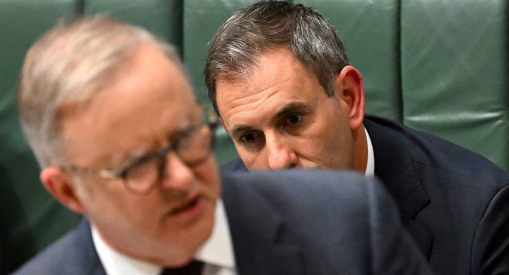 Treasurer Jim Chalmers listens to PM Anthony Albanese (Image: AAP/Lukas Coch)