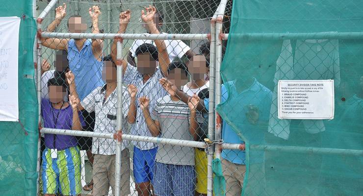 Asylum seekers imprisoned at Manus Island in 2014 (Image: AAP/Eoin Blackwell)