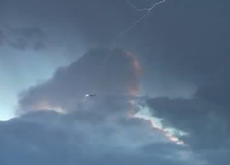 Immediately after the main visible strike a bright  'ball' appears (above) and than hangs a little longer behind the jet 